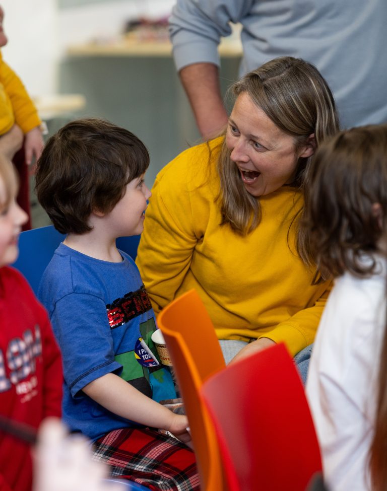 A play specialist and children playing together in the hospita