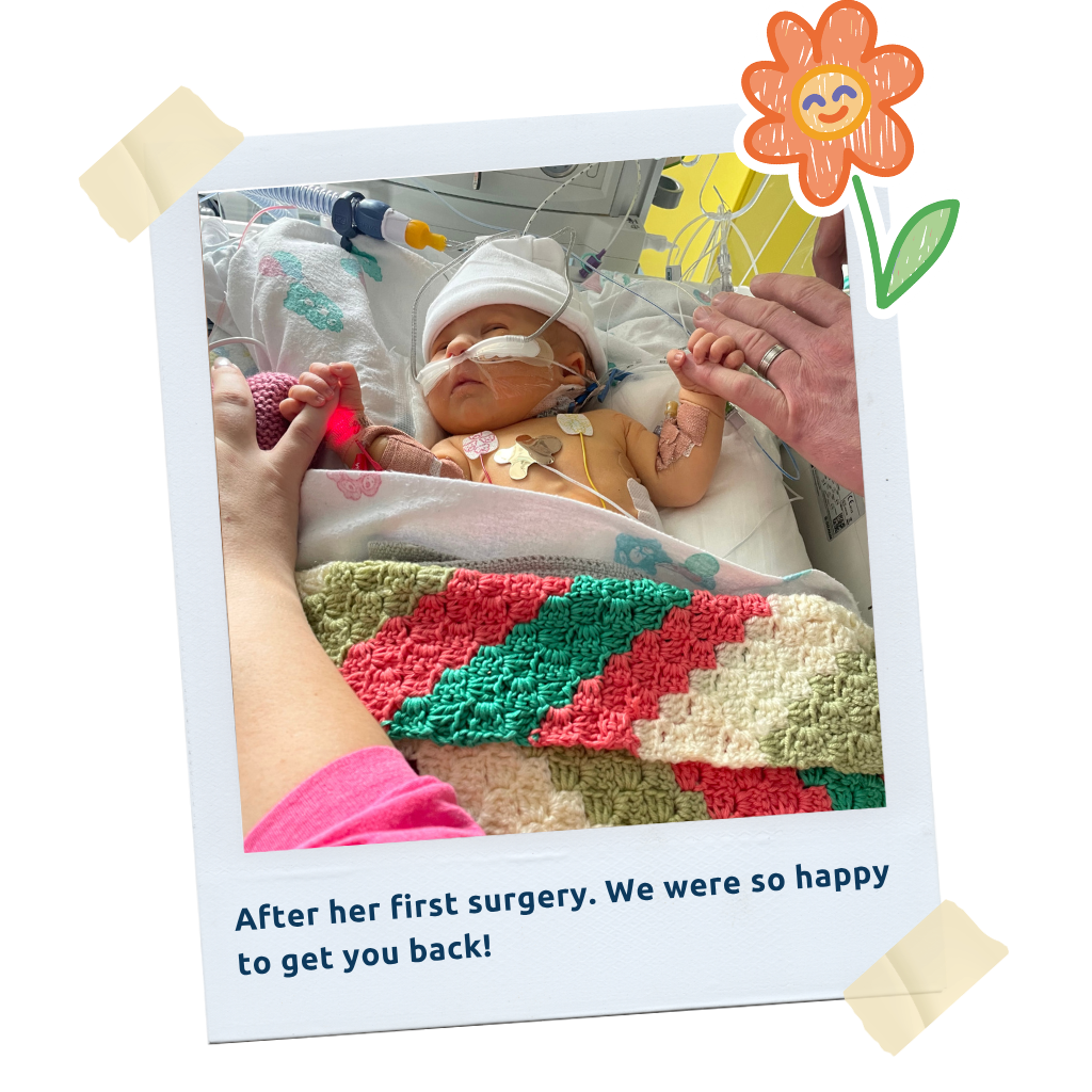 Lucy_LP_Thumb (3): "A polaroid-style photo of baby Lucy wrapped in a colourful blanket after her first surgery."