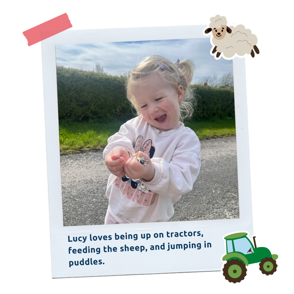 Lucy_LP_Thumb (4): "A polaroid-style photo of Lucy as a toddler outdoors, captioned about her love of tractors, feeding sheep and jumping in puddles."