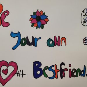 Art Teacher for Haemodialysis Patients: "A child's colourful artwork with hand-drawn flowers and writing