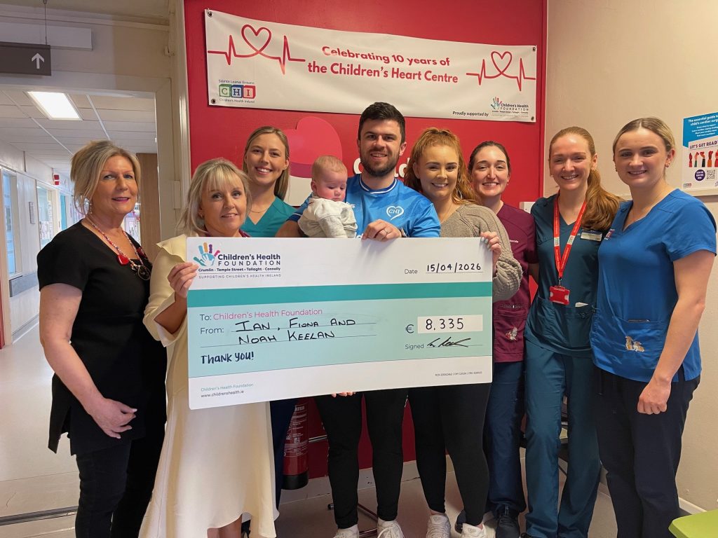 Ian, Noah and family presenting a cheque for €8,335 to staff at the Children’s Heart Centre at CHI Crumlin.