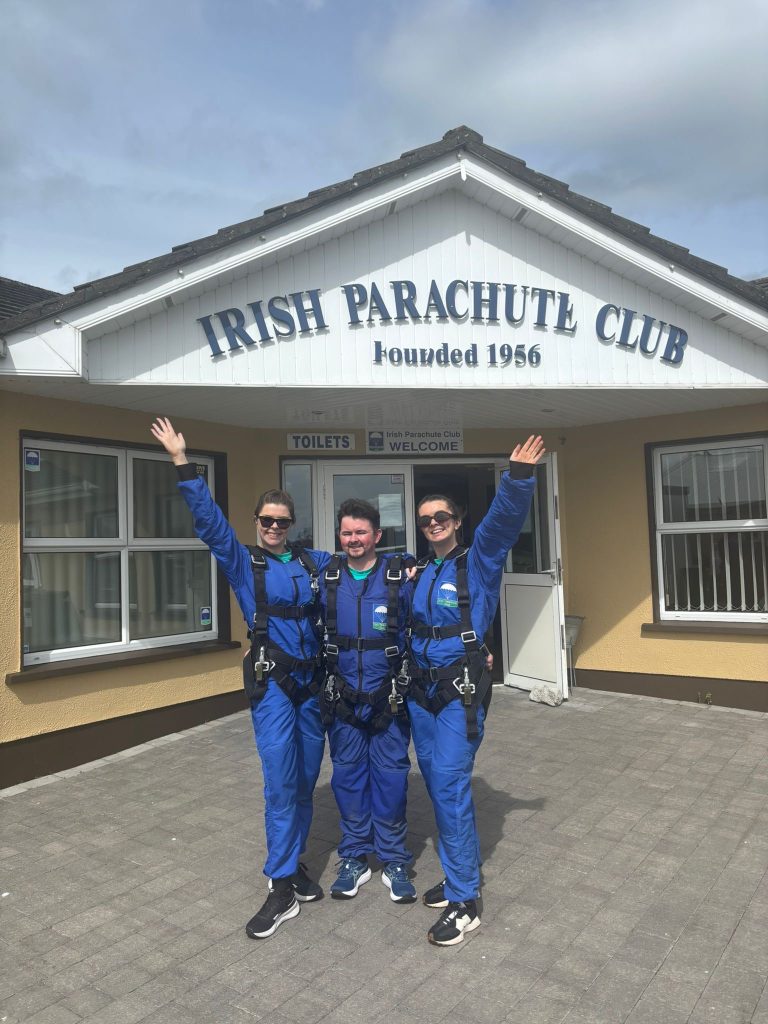 Darragh, Rachel and Eimear at the Irish Parachute Club after completing their fundraising skydive.