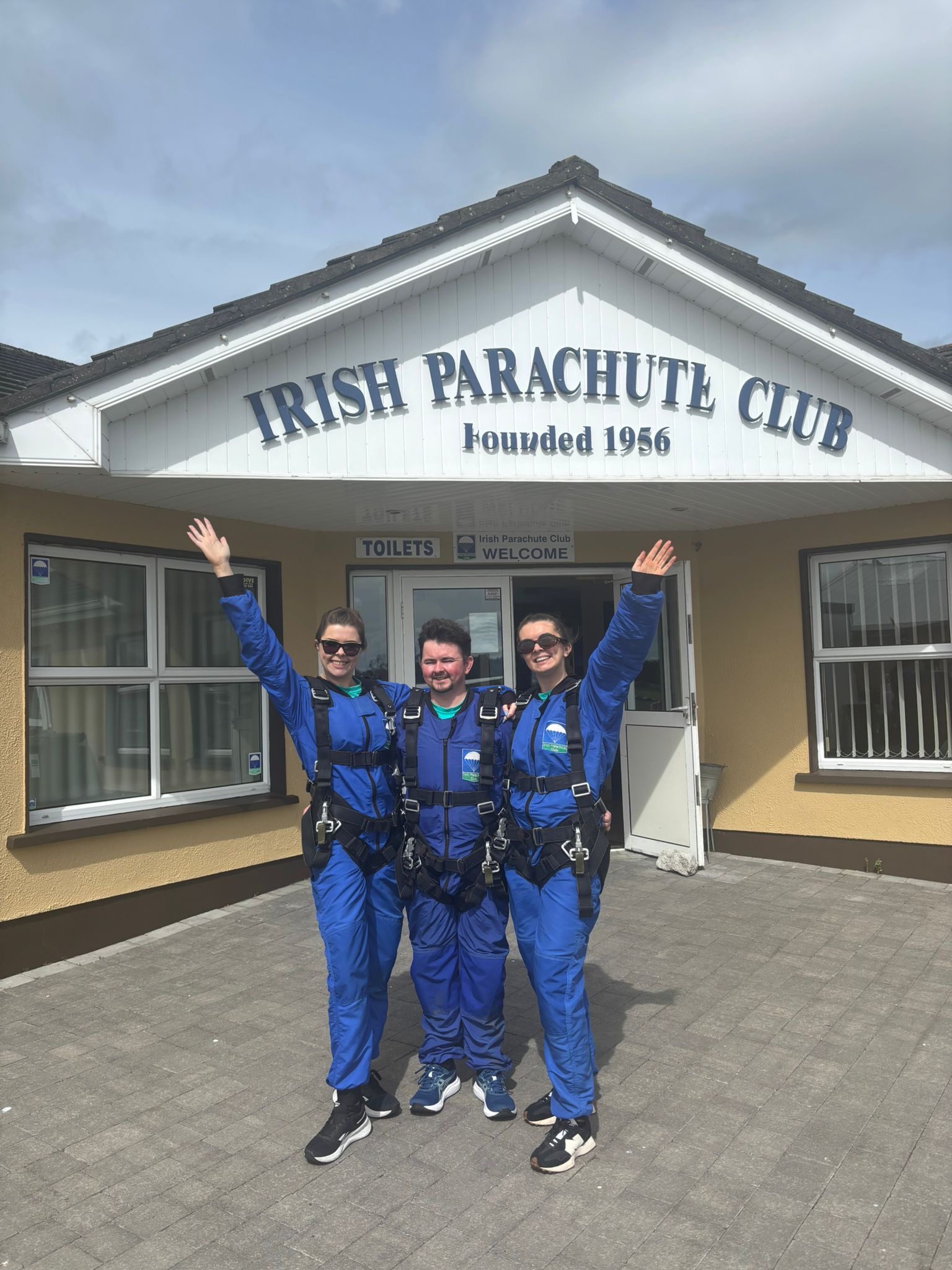 Darragh, Rachel and Eimear at the Irish Parachute Club after completing their fundraising skydive.
